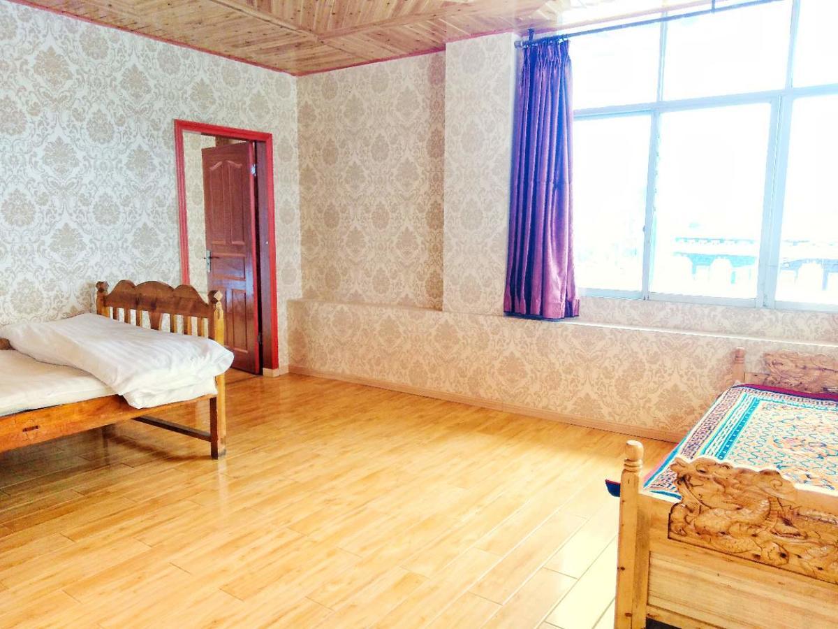Zishuo Zihua Guest House Daocheng Exterior foto