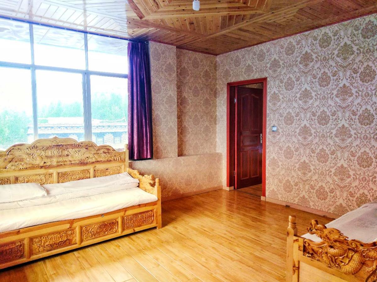 Zishuo Zihua Guest House Daocheng Exterior foto