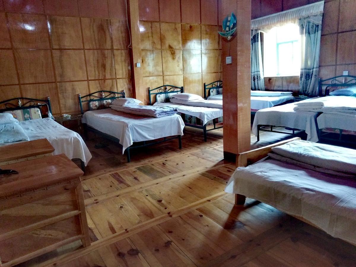 Zishuo Zihua Guest House Daocheng Exterior foto