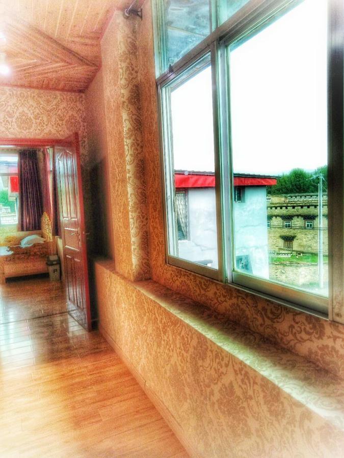 Zishuo Zihua Guest House Daocheng Exterior foto